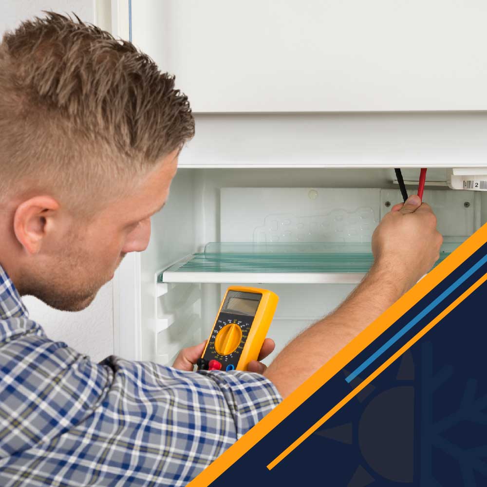 Technician-Checking-Fridge-With-Multimeter-Jeb-Air-houston-tx